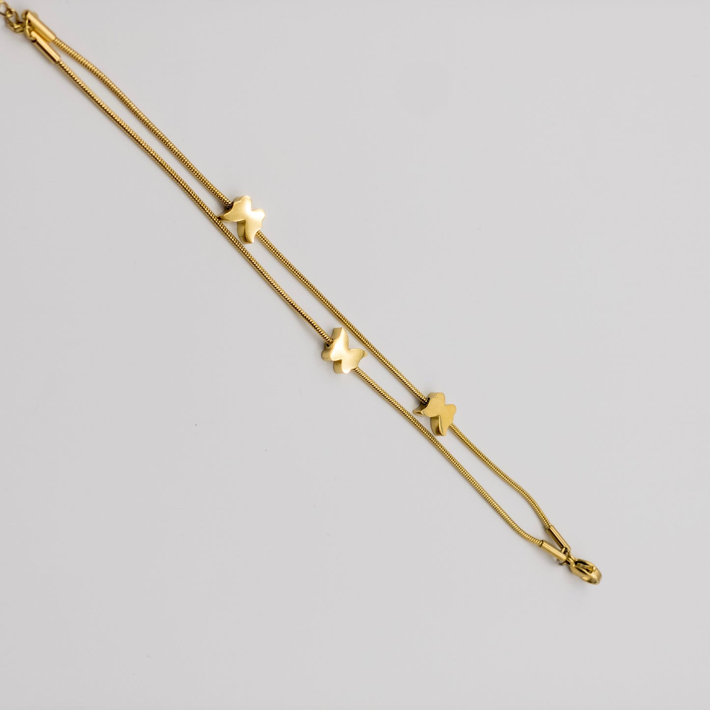 "Golden Flight" Triple Butterfly Snake Chain Bracelet (316L Premium Steel)