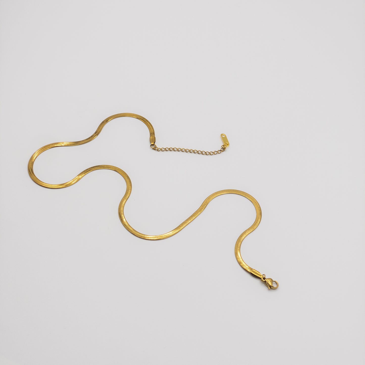 The "Liquid Gold" Flat Snake Chain Necklace (Herringbone)