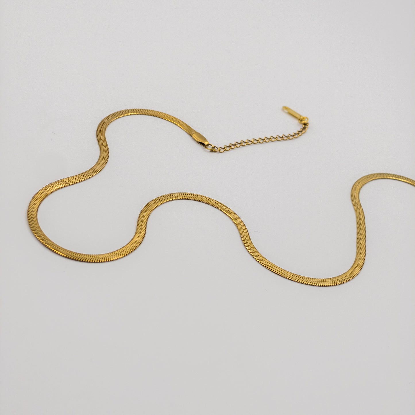The "Liquid Gold" Flat Snake Chain Necklace (Herringbone)