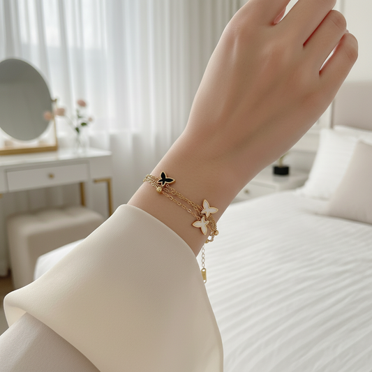 Woman wearing The Monarch Butterfly Double-Layer Bracelet in elegant setting